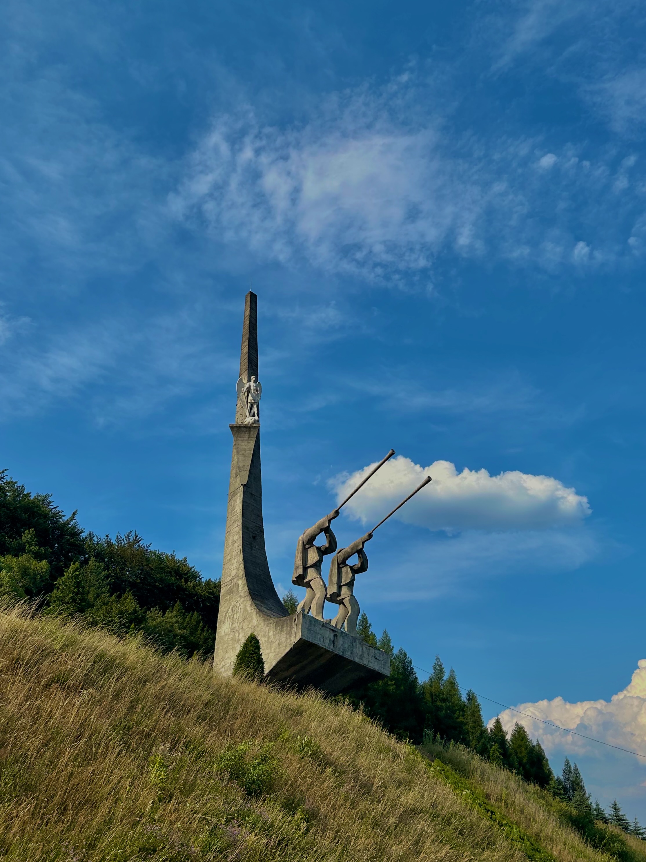 Soviet-era brutalist monument on a Carpathian hillside